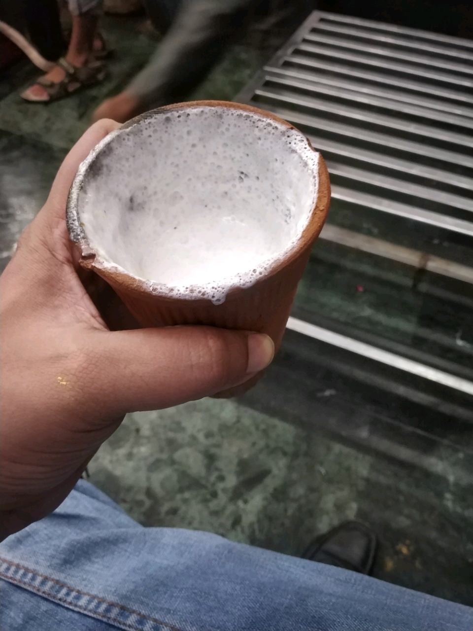 Traditional lassi in glass made with clay
